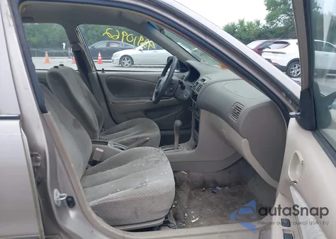 1999 Toyota Corolla Ce from USA, damaged, VIN 2T1BR12E3XC246635